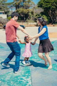 a happy family dancing